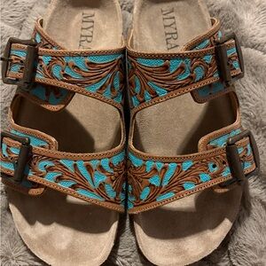 MYRA MEADOW SKY HANDTOOLED LEATHER SANDALS IN SAGEWAVE BLUE